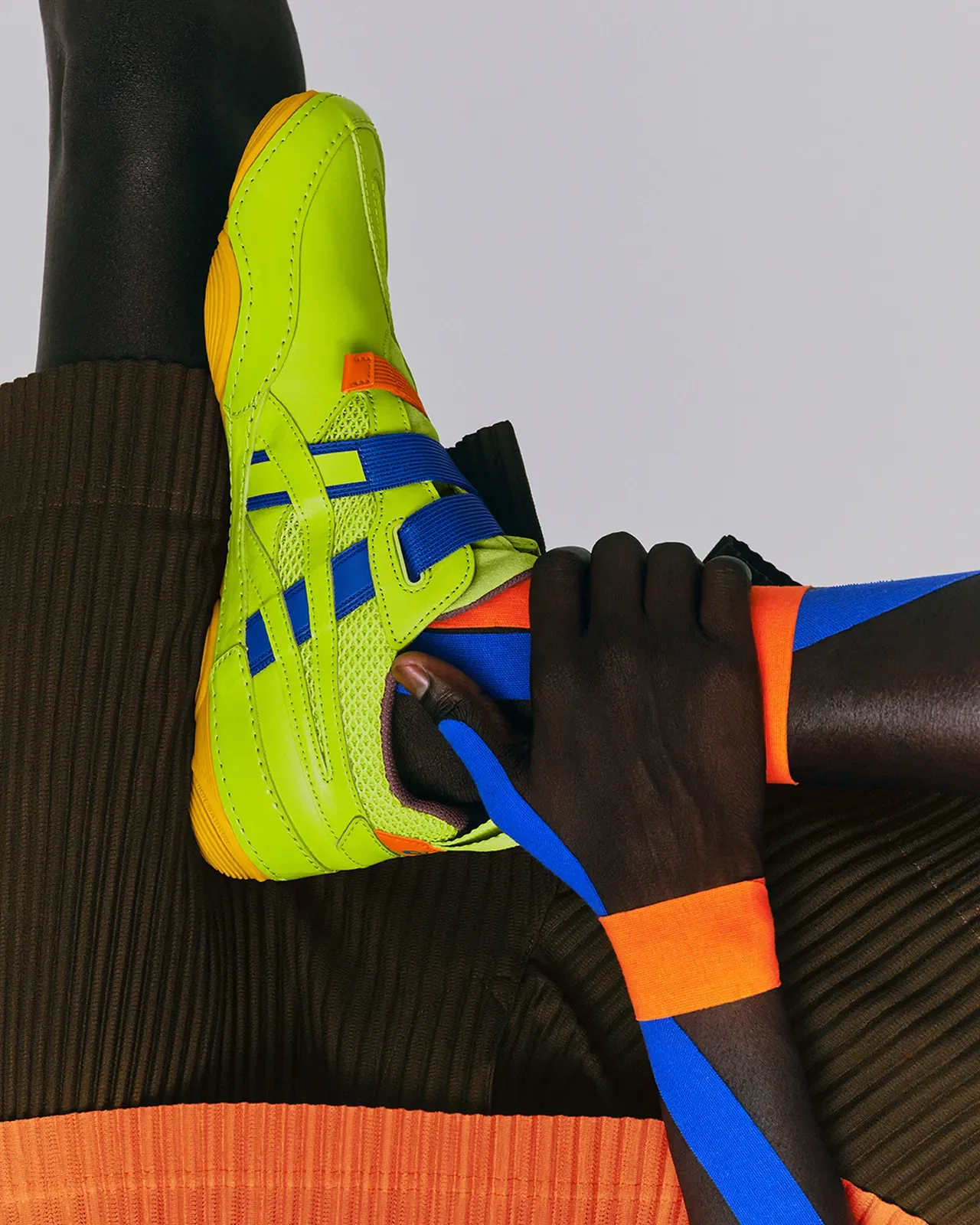/Photo: ASICS x Miyake — HYPER TAPING™ makes its disruptive debut in fashion.